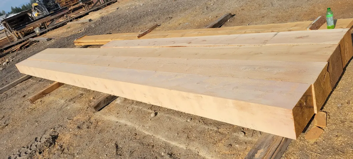 Wide live-edge slab showing natural grain and edge detail